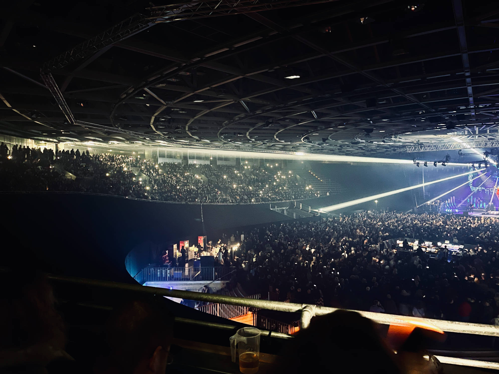 Stadium audience holding up hundreds of little lights
