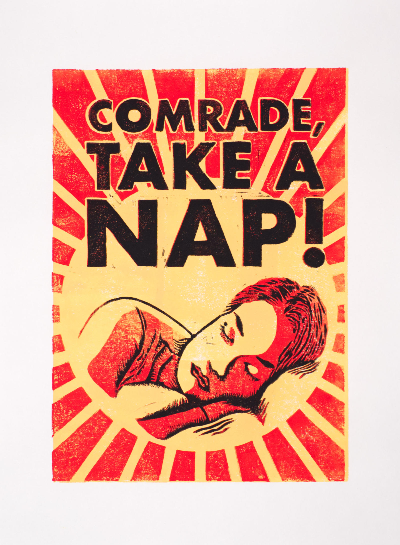 Multi-color linocut print (yellow, red, black) of a sleeping woman's face in style of soviet era propaganda posters with capital letter caption: "COMRADE, TAKE A NAP!"