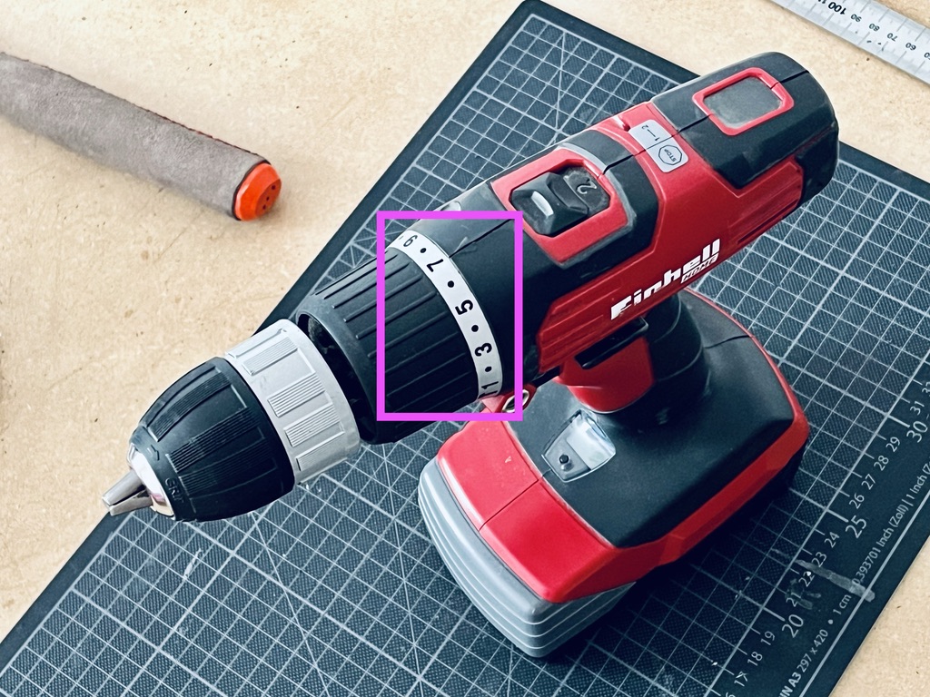 photo of a battery power drill with the rotary number dial around the head highlighted